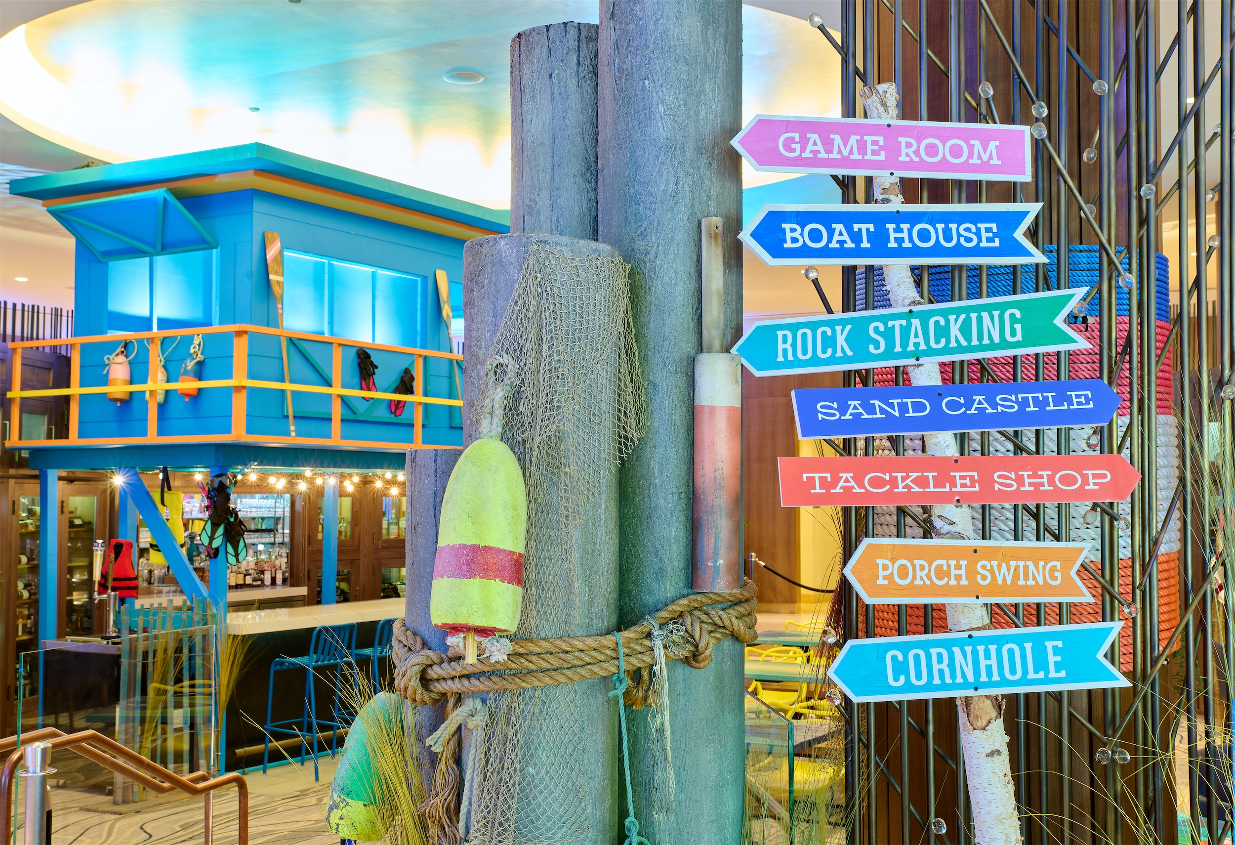 Arrow navigation signs highlighting Lake House activities