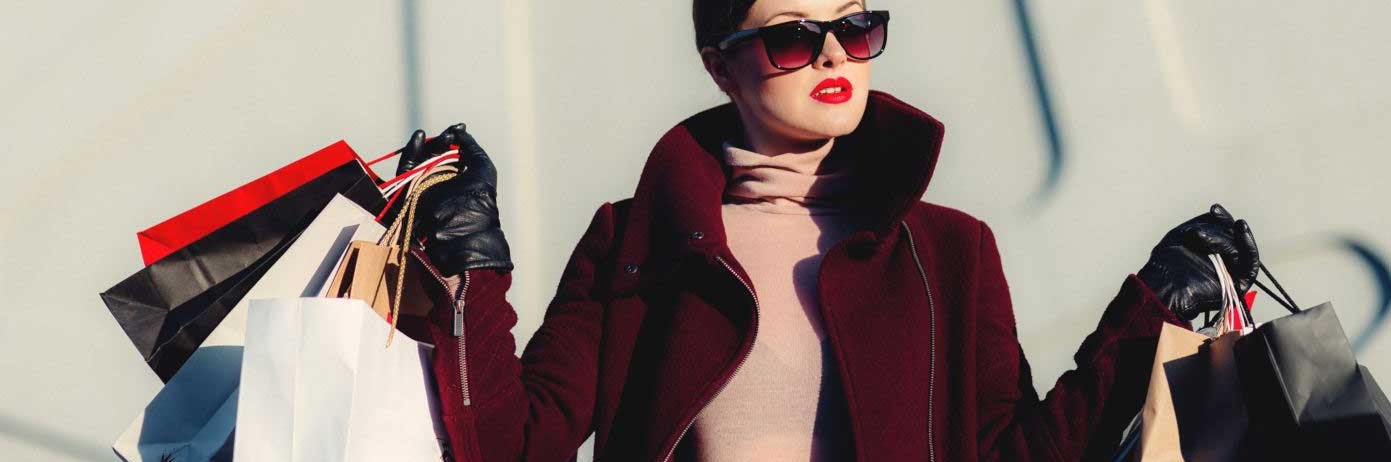 woman carrying shopping bags