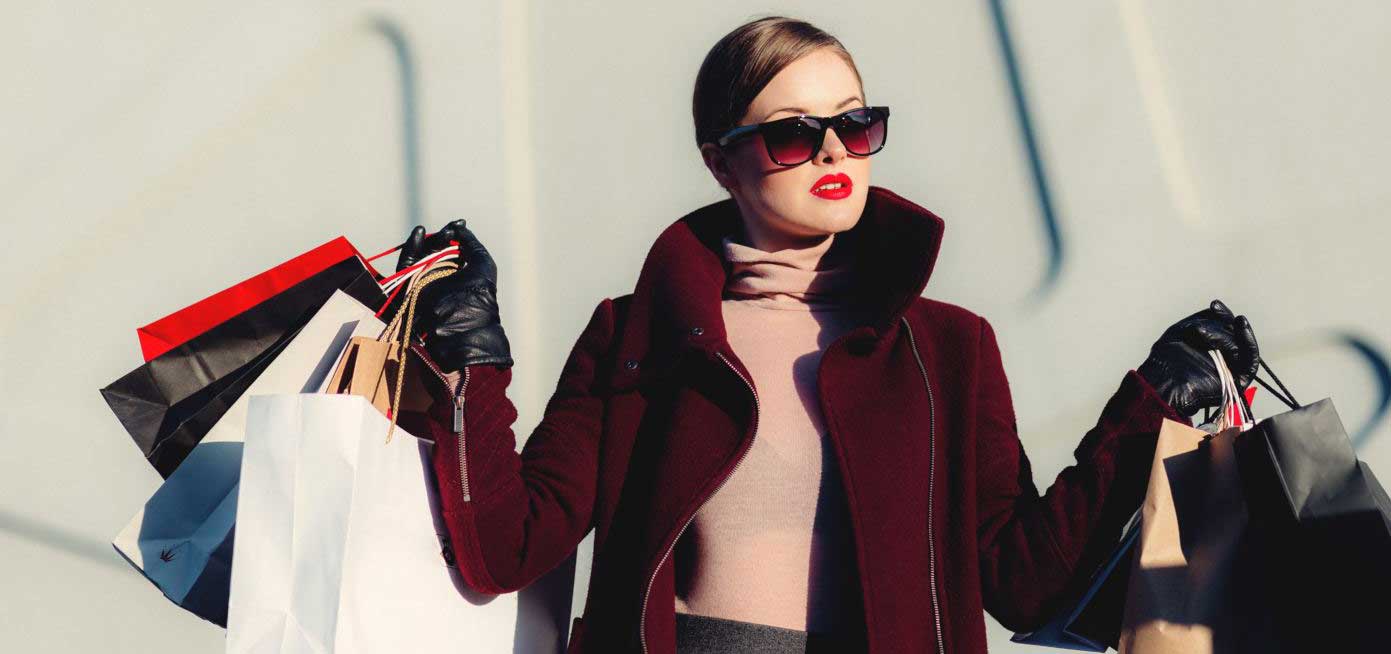 woman carrying shopping bags