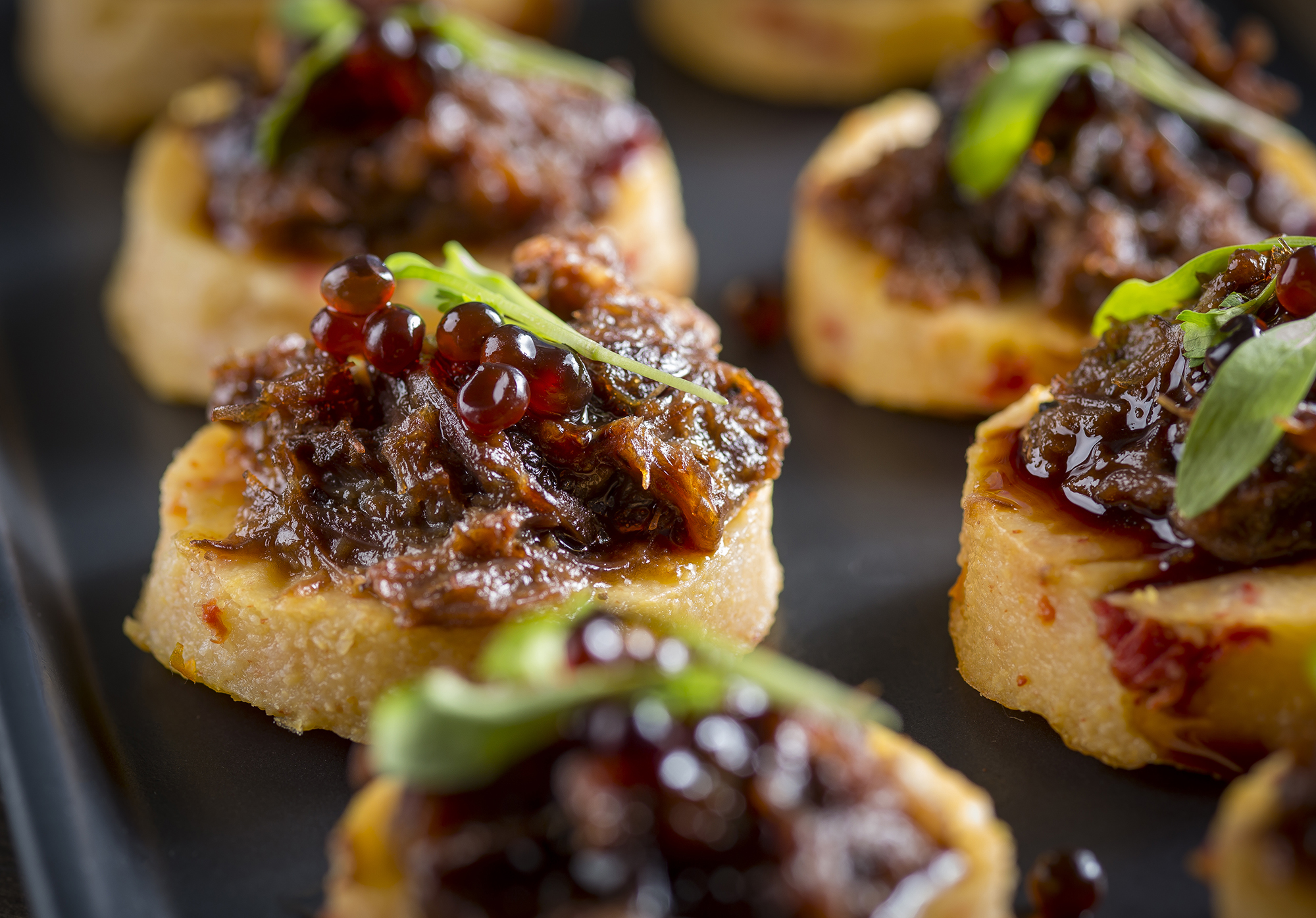 short rib polenta sundried tomato cake with caviar